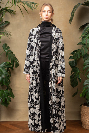 Blossom in black Abaya