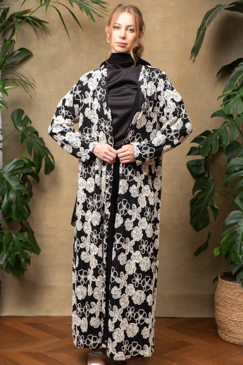 Blossom in black Abaya